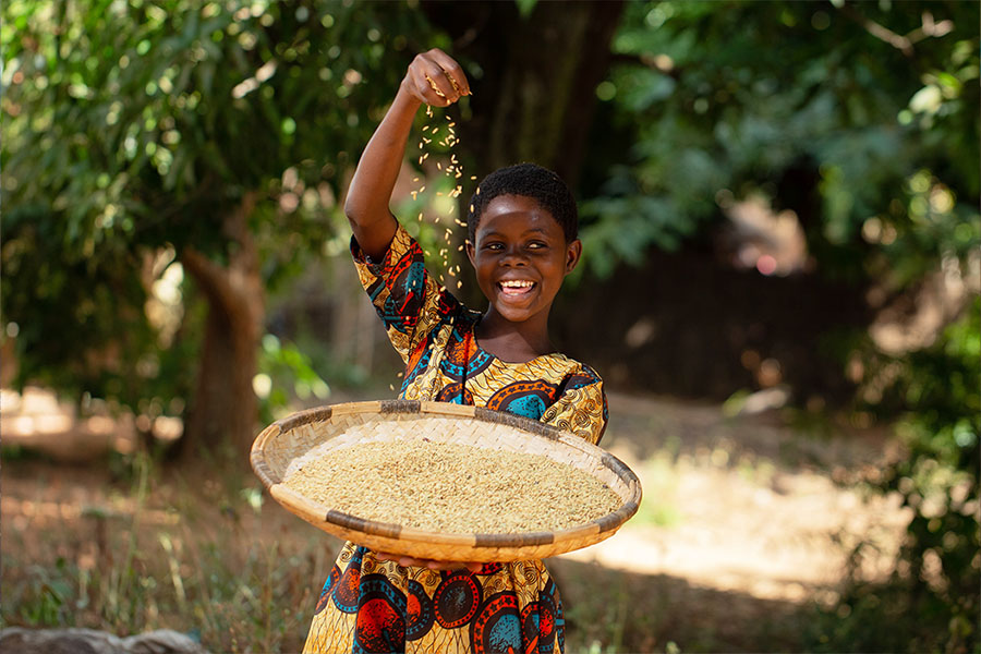 Mazaa, a participant in the Drylands Development Programme, proudly shows off growing
seedlings in her community nursery in Kenya.